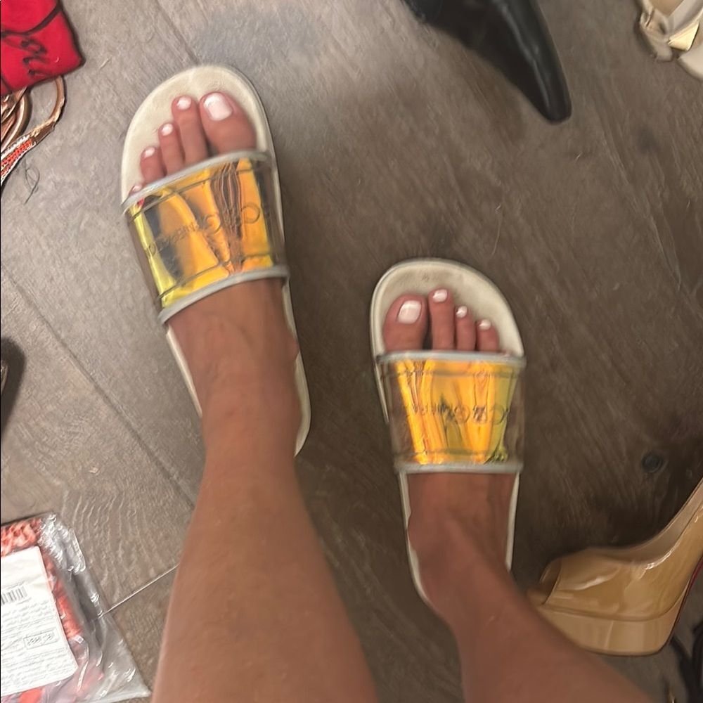 BCBGeneration Gold and White Sandals with Modern Design